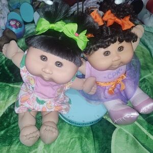 CPK Dolls with Green and Orange Bows